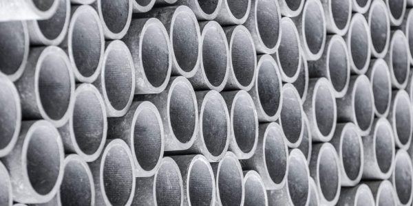 closeup-of-asbestos-pipes-on-construction-site-scaled-1